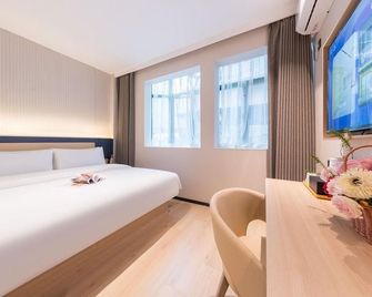 7 Days Inn Guangzhou Beijing Road Metro Branch - Cantón - Habitación