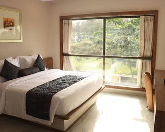 Nest Beacon Resort Daman - Daman - Schlafzimmer