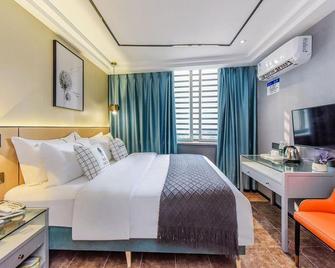 Chongqing Yueyou Hotel Shapingba Branch - Chongqing - Bedroom