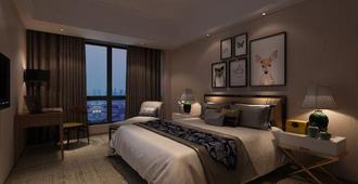 Sanyou International Hotel - Taizhou - Bedroom