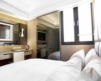 Royal Group Hotel Ho Yi Branch - Kaohsiung City - Habitació