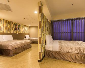 بالمر هوتل - تايتشونغ - غرفة نوم