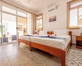 Macmillan's Holiday Villas - La Digue - Schlafzimmer