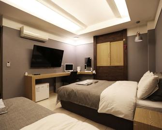 Boutique hotel k Dongdaemun - Seoul - Soveværelse