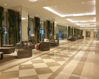 Cosmy Orchard apartment in Surabaya - Surabaya - Hall d’entrée