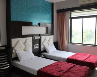 Hotel Saffron - Navsari - Habitación