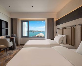 Yahaige Hotel - Qingdao - Bedroom
