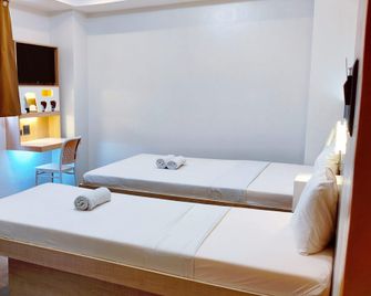 New Era Cebu Pension Inn - Cebu - Camera da letto