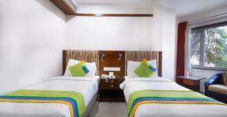 Treebo Ambassador - Ahmedabad - Bedroom