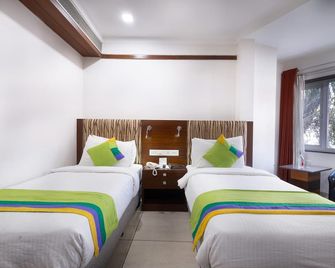 Treebo Ambassador - אחמדאבאד - חדר שינה