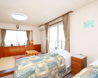 Pension Green Grass - Камакура - Спальня