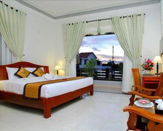 Camellia Homestay - Hội An - Schlafzimmer