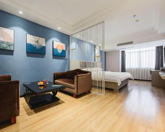 Greentree Inn Jiangxi Ganzhou Municipal Government Business Hotel - Ganzhou - Bedroom