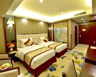 Greentree Eastern Hotel - Zigong - Bedroom