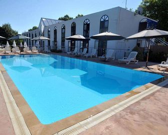 Agape Hotel - ניור - בריכה