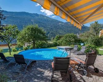 Ferienwohnungen Angermaier - Flattach - Zwembad