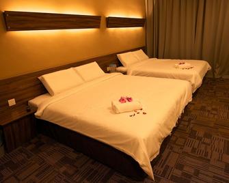 دي بوتاني أوتيل - إيبوه - غرفة نوم