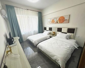 Anheju Hotel (Jinzhou Open University Branch) - Jinzhou - Camera da letto