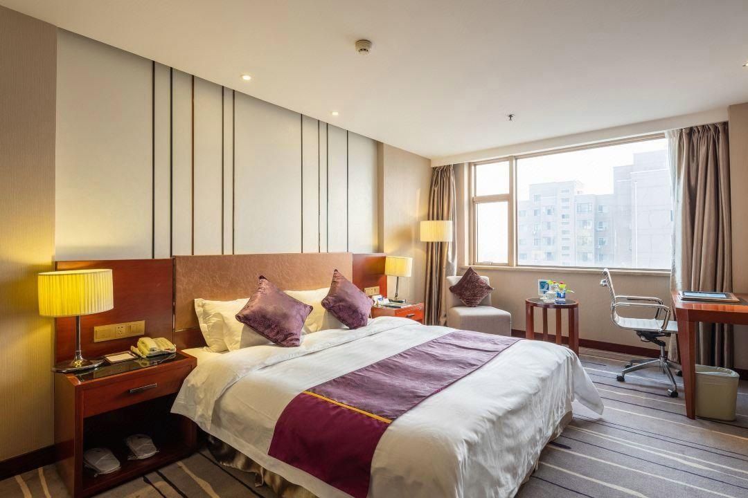 New Seaview International Hotel - דאליין - חדר שינה