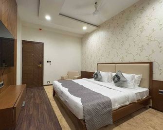 Pam Premium Hotel Vadodara - Vadodara - Κρεβατοκάμαρα