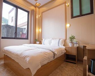 Quyenly Motel - Meo Vac - Camera da letto