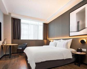 Tiangang Manfei Hotel (Ningbo Railway Station Lianfeng Metro Station Branch) - נינגבו - חדר שינה