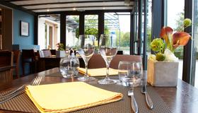 博納基里亞德酒店 - 波恩 - 波納山坡 - 餐廳