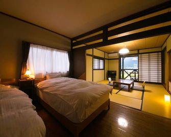 Yufuin Bath Satoyamasafu - Yufu - Bedroom