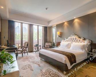 Ziyun'ge Hotel - Shiyan - Schlafzimmer