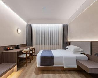Wujia Hotel - Yichang - Slaapkamer