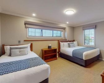 Quantum Lodge Motor Inn - המילטון - חדר שינה
