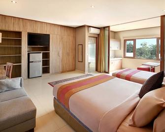 Puri Sabina Bed & Breakfast - South Kuta - Bedroom