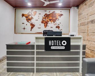 Super Hotel O Bopodi Near Pune It Park - Pimpri - Chinchwad - Front desk