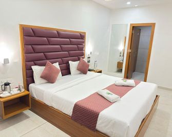 Hotel Paras Royal - Kota - Schlafzimmer