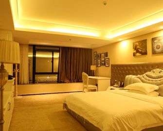 Wisdom Hotel - Maoming - Habitación