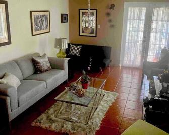 Apartment in the city, 5 minutes from the airport and the beach - Carolina - Living room
