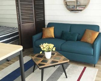 House - Plougoumelen - Sala de estar