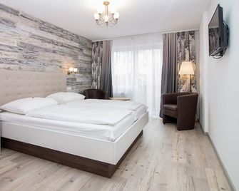 Hotel Diana Garni - Malente - Slaapkamer