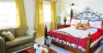 Beachcombers Hotel - Biabou - Bedroom