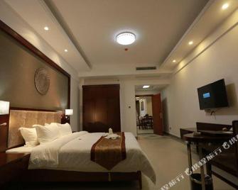 Hongda Hotel - Qionghai - Bedroom
