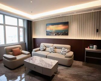 Wanda Business Hotel - Heihe - Bedroom