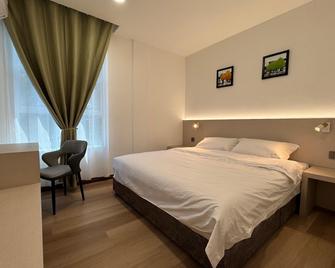 Pepper Inn - Sibu - Habitación
