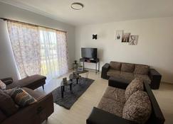 Spacious vacation place in Bavaro-Punta Cana 10 min from the airport - Bavaro - Living room