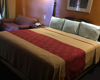 Budget Inn and Suites - Abbeville - Bedroom