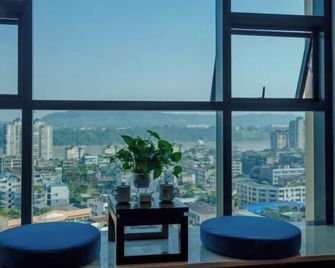 Jiu Long Ying Bin Hotel - Їбін - Спальня