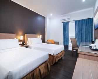 Noola Hotel Cilacap - Cilacap - Ložnice