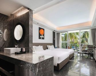 Sanya cocobay Homestay (Yalong Bay Bohou Branch) - Sanya - Bedroom