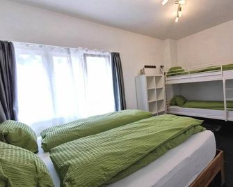 Apartments Steinbock - Leukerbad - Bedroom
