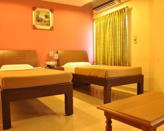 Arasan Inn - Chennai - Bedroom