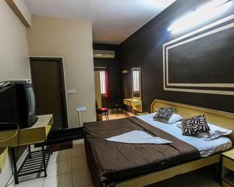 Hotel Sabharwal Inn - Bangalore - Camera da letto